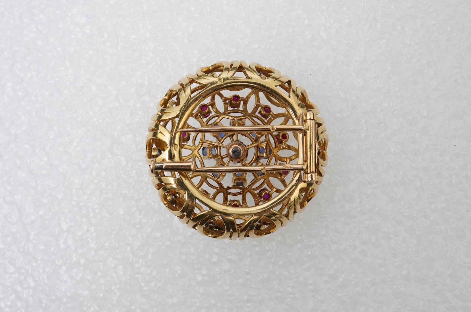 Mellerio dits Meller, a ruby and sapphire brooch, mid 20th century